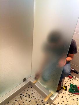 frosted glass shower door wall